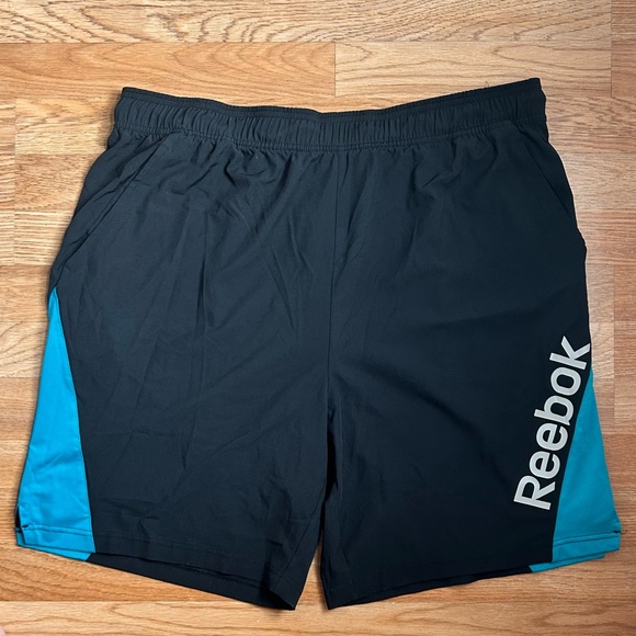 Reebok Men's Athletic Shorts in Black with Blue Panels - Picture 1 of 3